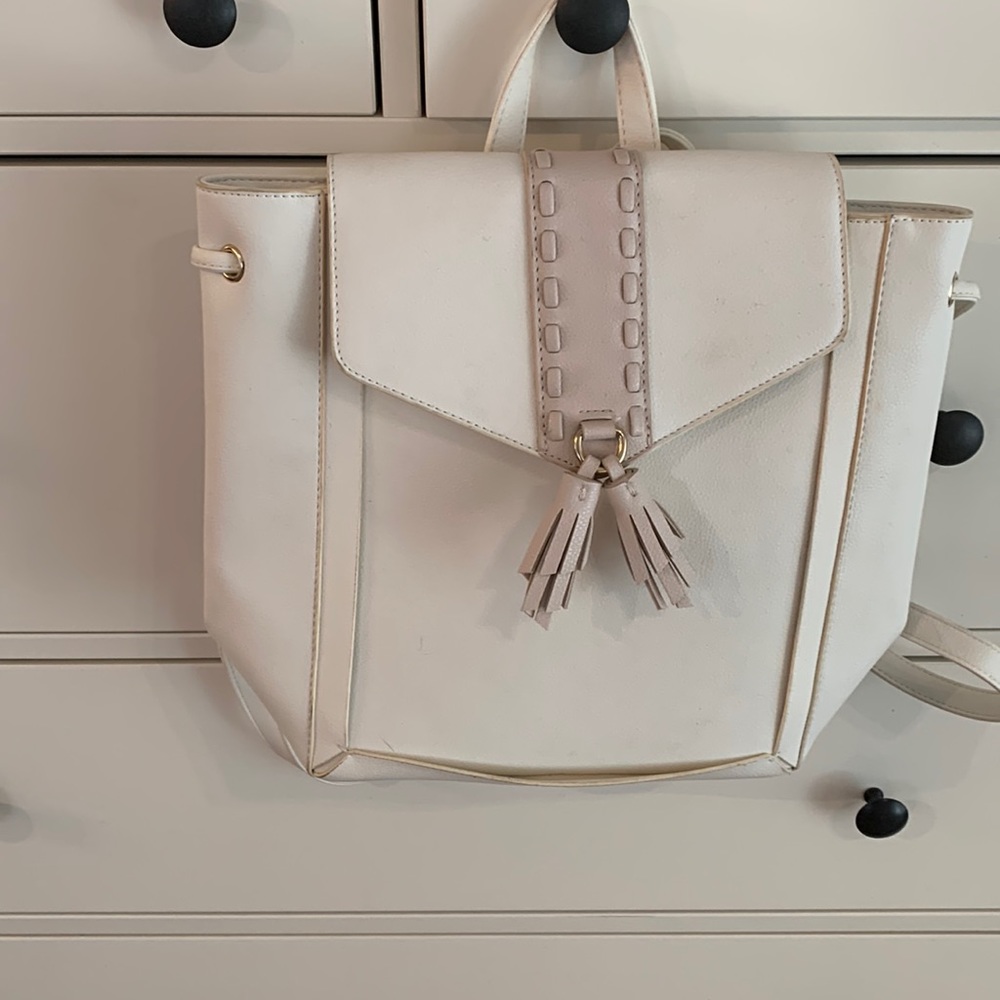 White and pink Lionel faux leather backpack. Used once: